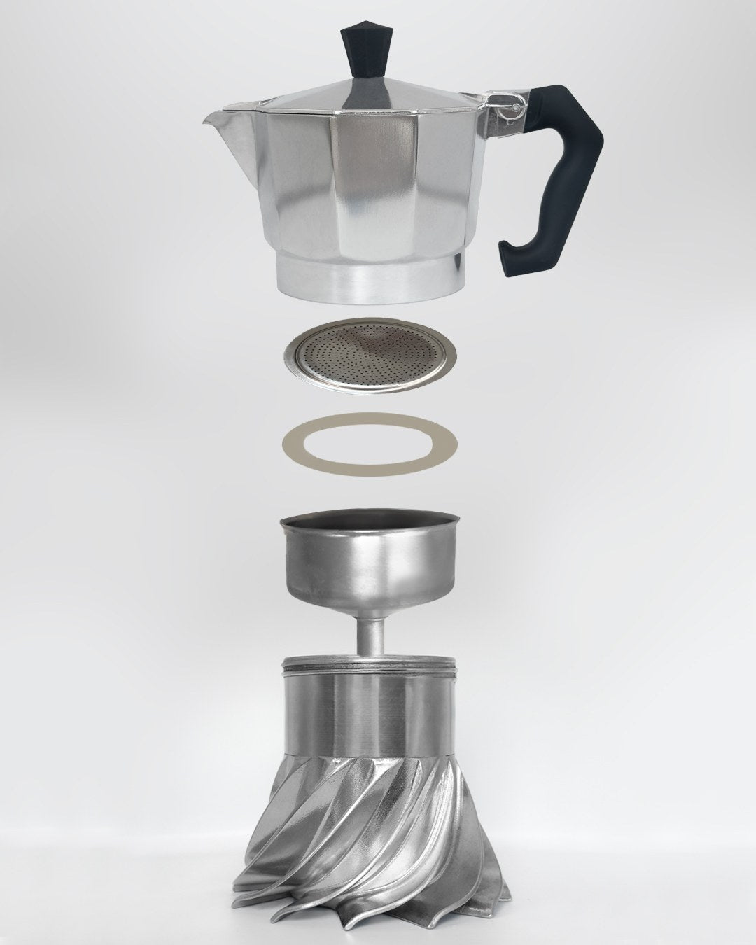 Exploded view of the Turbo Moka 3-cup showing the top chamber, filter plate, silicone gasket, funnel and finned boiler